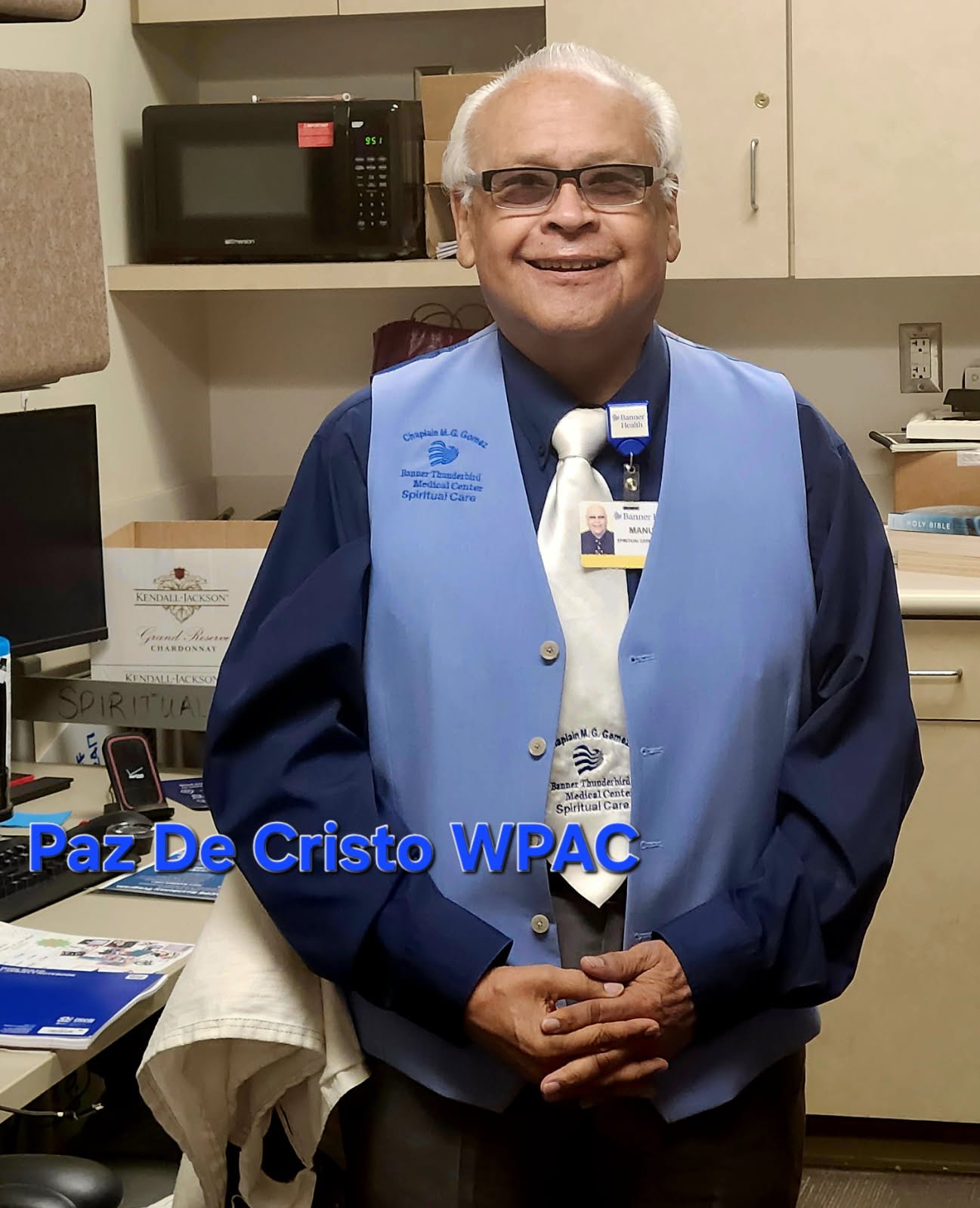 Portrait of Chaplain Mannie Gomez in his Banner Thunderbird spiritual care vest